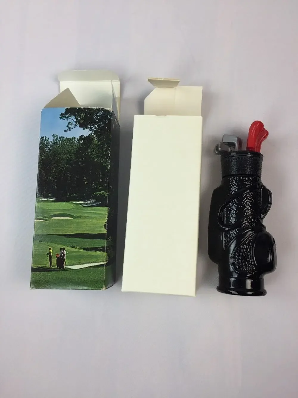 AVON 1969 THE SWINGER DECANTER. WILD COUNTRY AFTER SHAVE 5 FL. oz. Golf